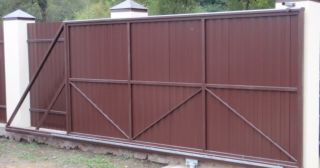 Купить откатные ворота из профнастила Реутов, цена от 1780 руб.