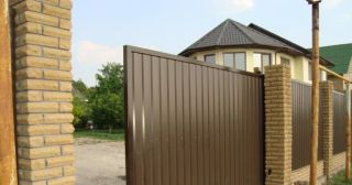 Купить откатные ворота из профнастила Реутов, цена от 1780 руб.